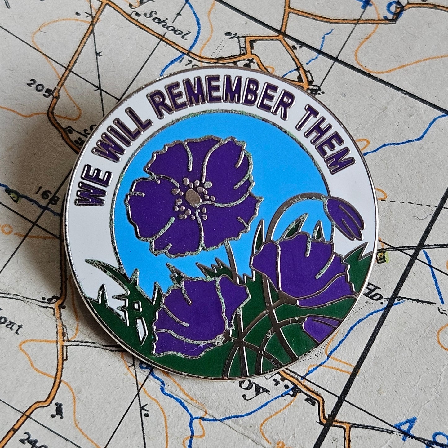 We Will Remember Them Pin Badge. (White)