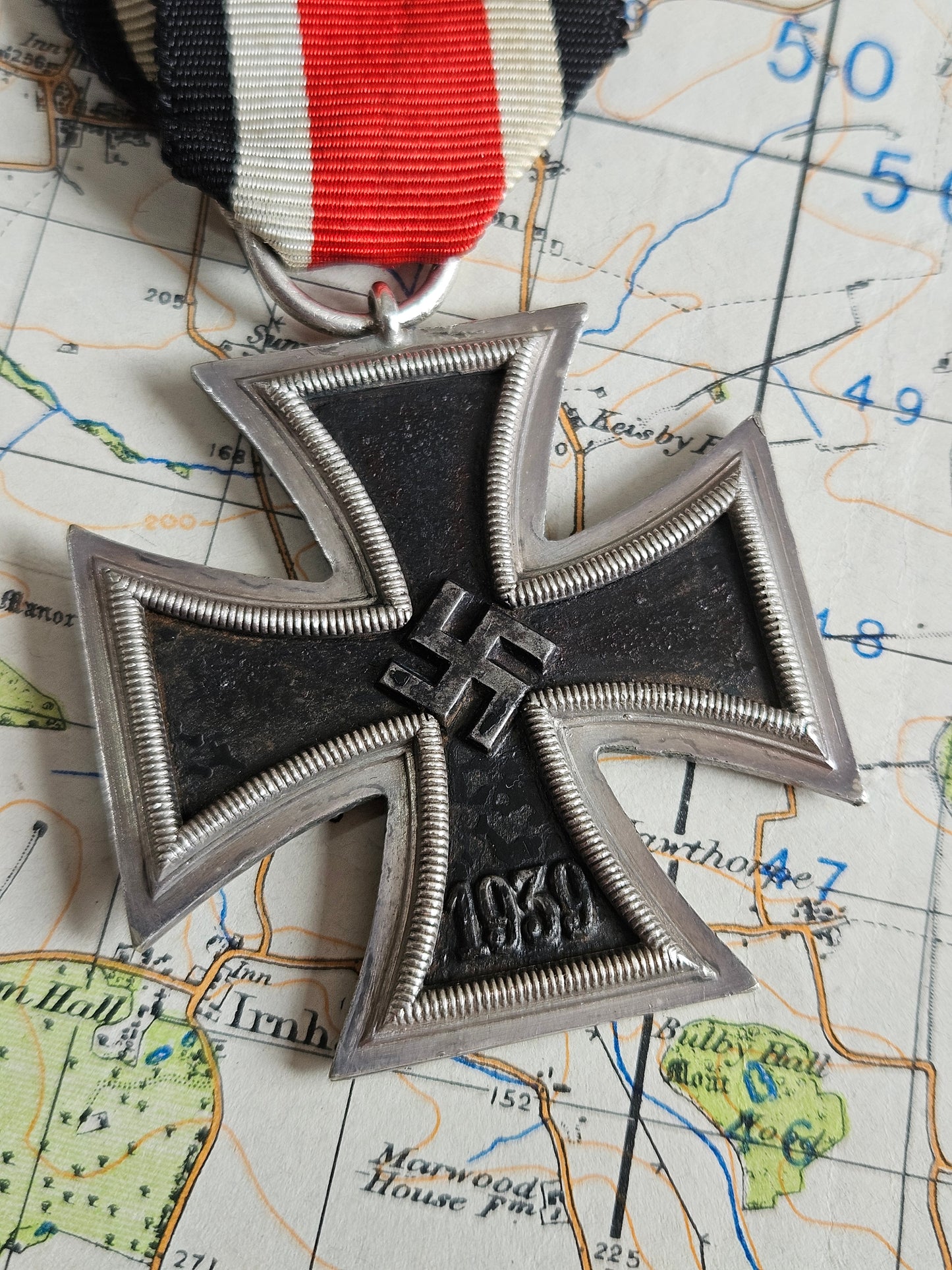 Original WW2 German, Nazi Iron Cross 2nd Class medal with Ribbon. C.E.Juncker, 2 Mark.