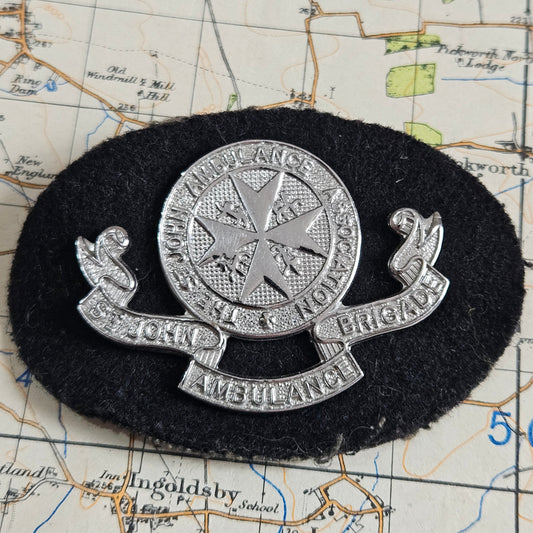 The St.John's Ambulance Association Brigade Shoulder Title Badge