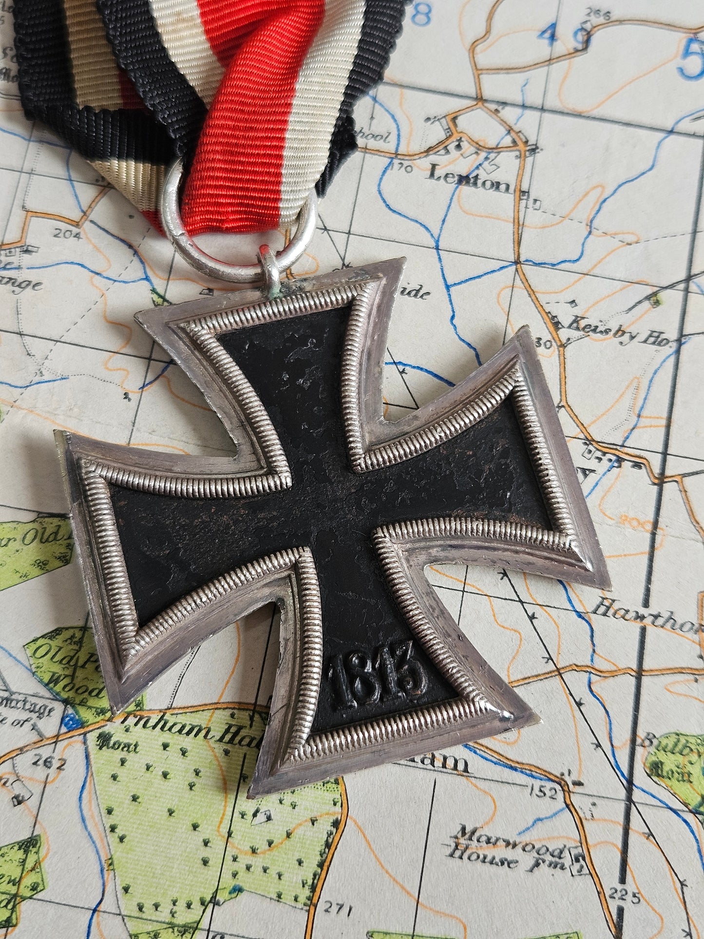 Original WW2 German, Nazi Iron Cross 2nd Class medal with Ribbon. C.E.Juncker, 2 Mark.