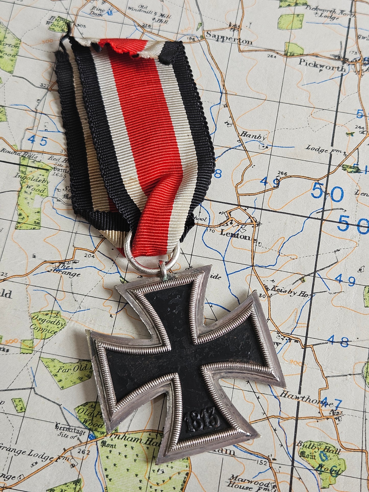 Original WW2 German, Nazi Iron Cross 2nd Class medal with Ribbon. C.E.Juncker, 2 Mark.