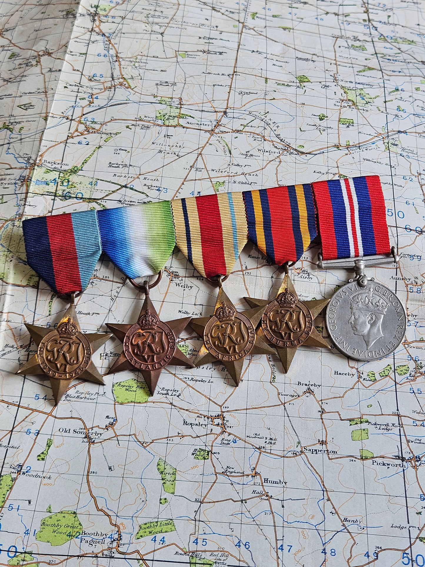 Original WW2 Star and War Medal Group on bar.
