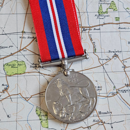 Original WW2 1939/45 War Medal with ribbon.