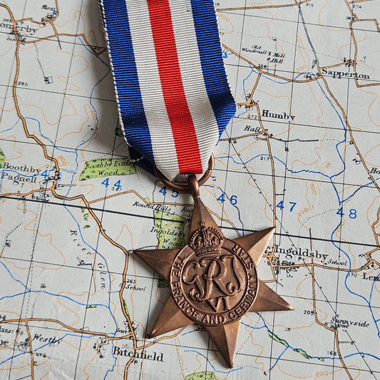 Original WW2 France & Germany Star Medal with ribbon.