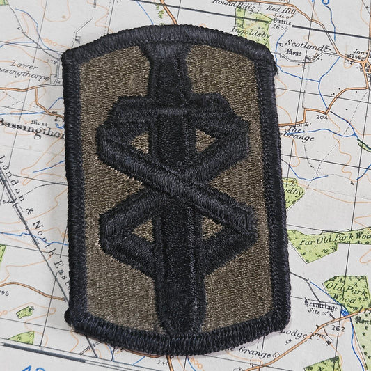 18th Medical Brigade Subdued On Olive Embroidered US Army shoulder sleeve insignia