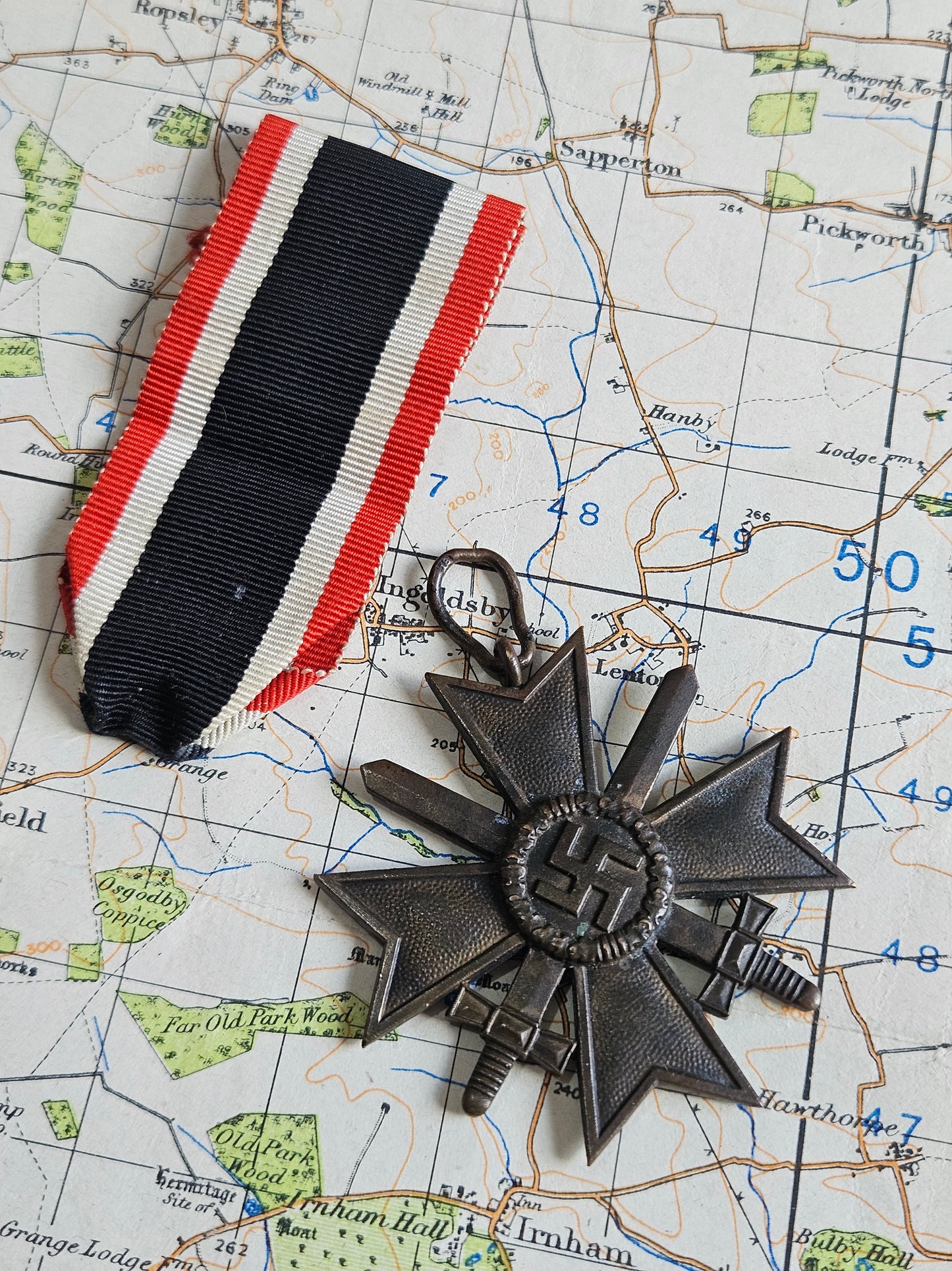 WW2 German War Merit Cross with Swords. 18 Mark for Karl Wurster