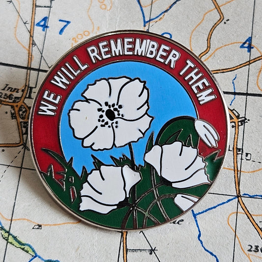 We Will Remember Them Pin Badge. (Red)