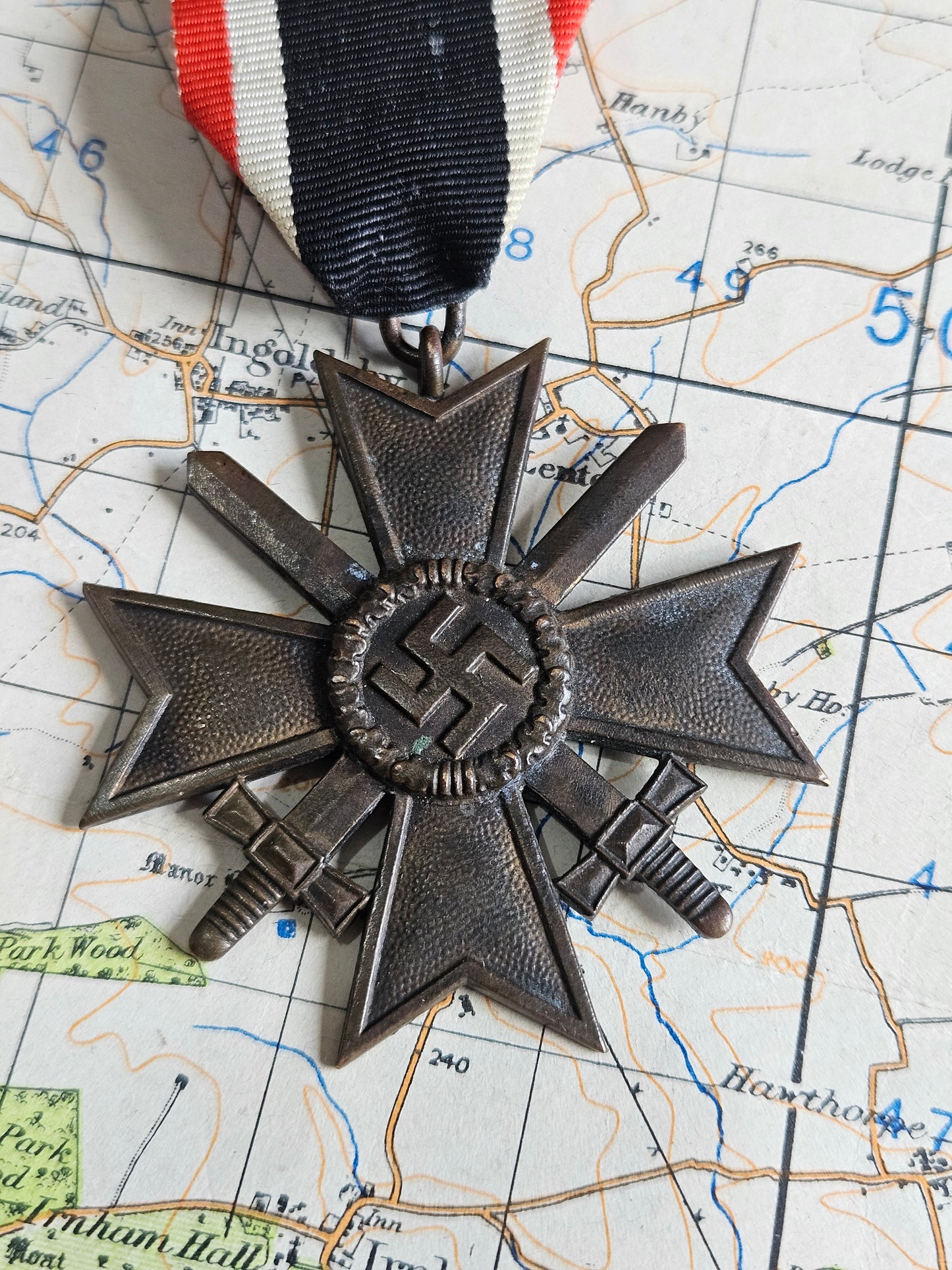WW2 German War Merit Cross with Swords. 18 Mark for Karl Wurster