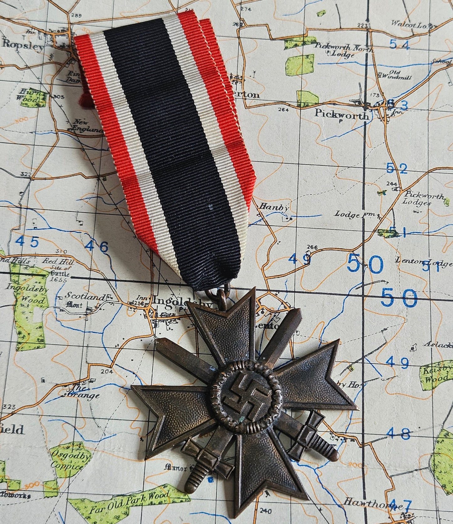 WW2 German War Merit Cross with Swords. 18 Mark for Karl Wurster