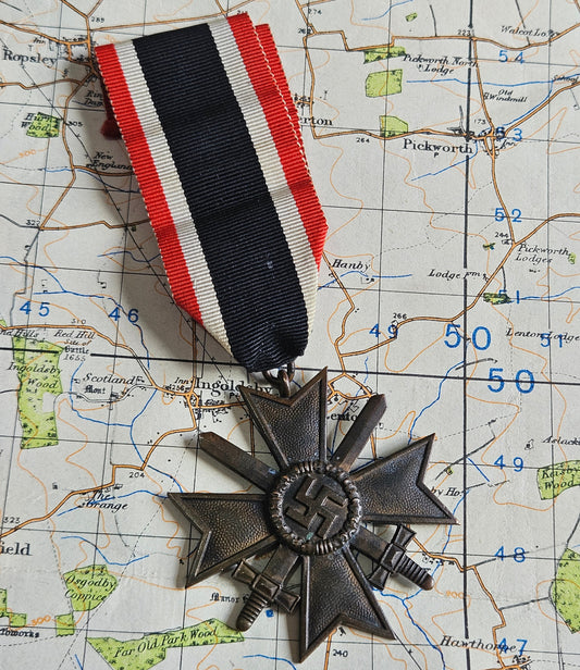 WW2 German War Merit Cross with Swords. 18 Mark for Karl Wurster